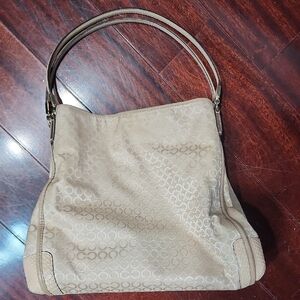 Coach Madison Phoebe shoulder bag featuring the brand's signature Op Art